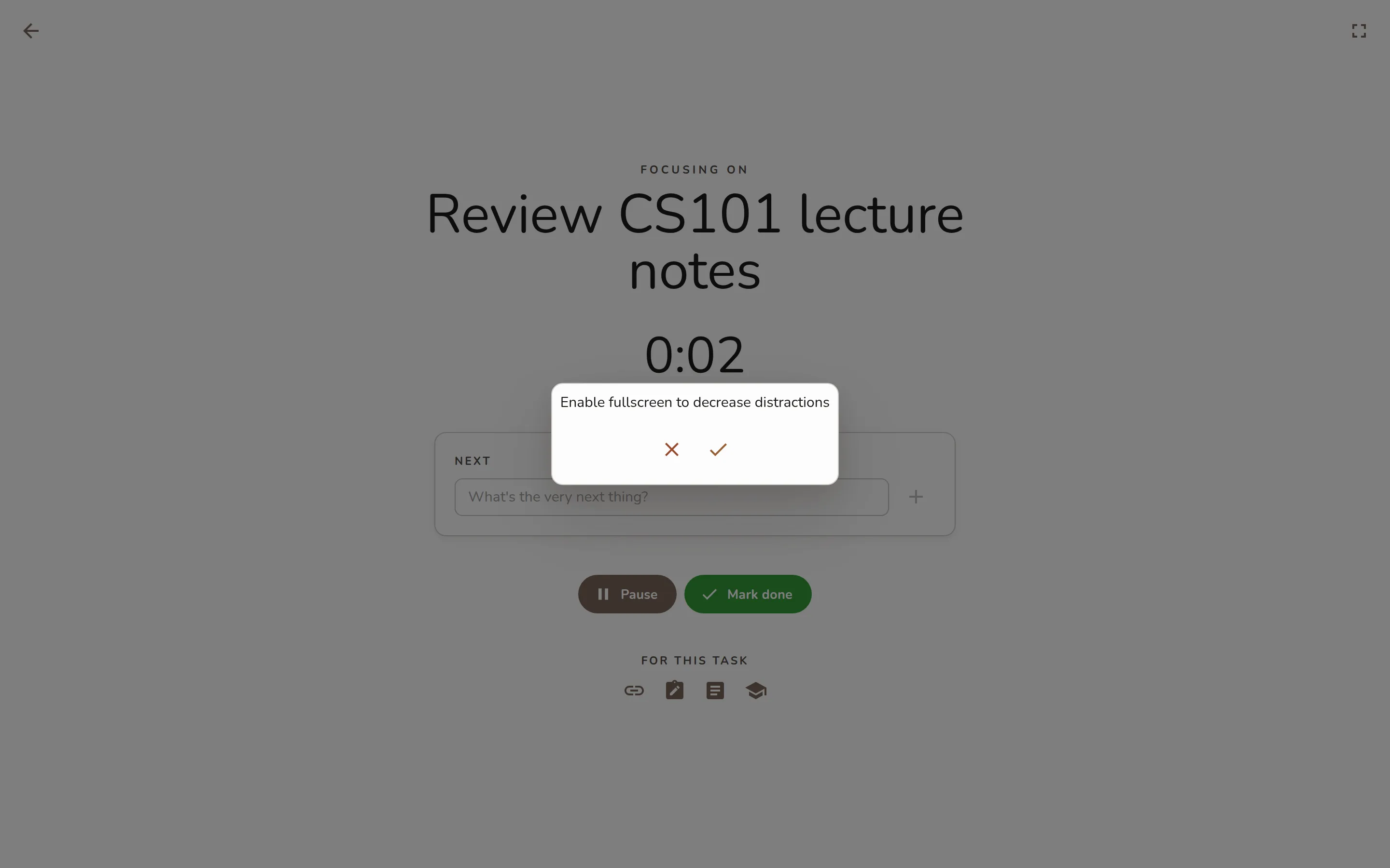 A running focus session: "Focusing on" task title, the count-up timer, the Next action card with its checkbox, and the Pause / Mark done control row.
